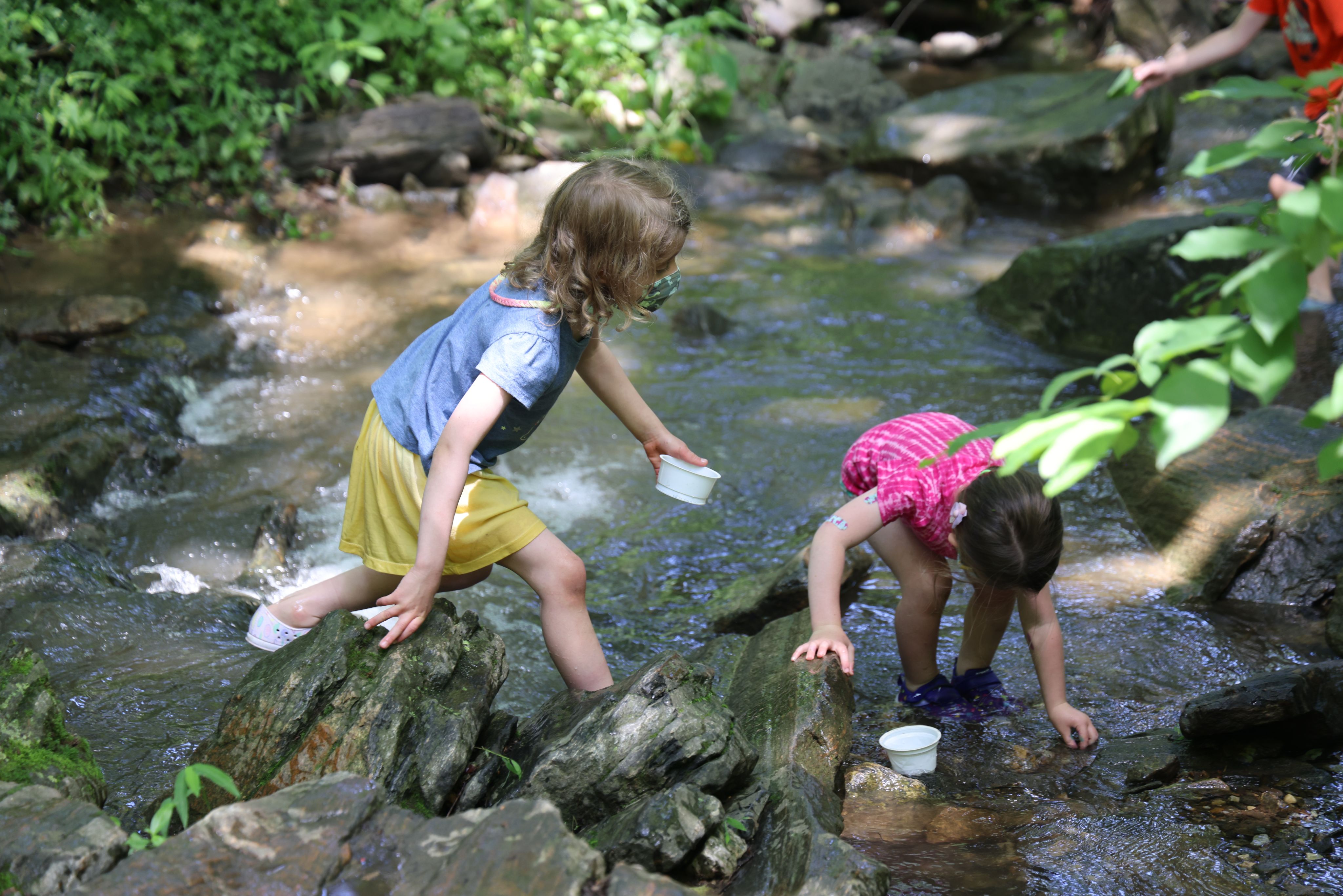 toddler playing water
